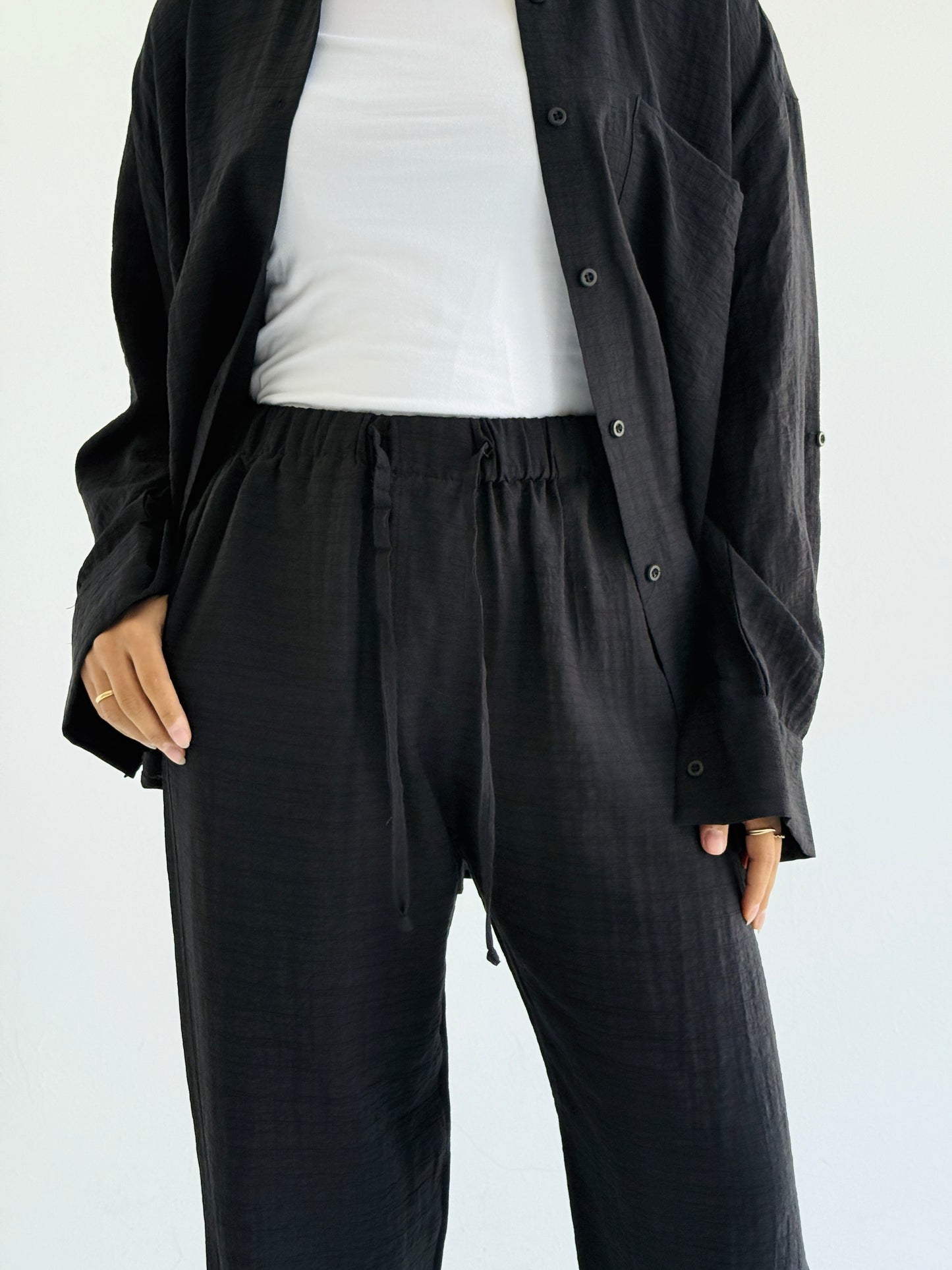 TAWA Women's Black Textured Trousers